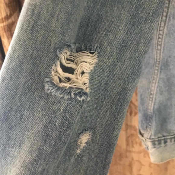 Distressed jean jacket, lots of rips and vintage looking. Comfy too - Picture 2 of 7